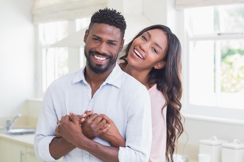 young couple hugging | tooth extractions sunnyvale ca