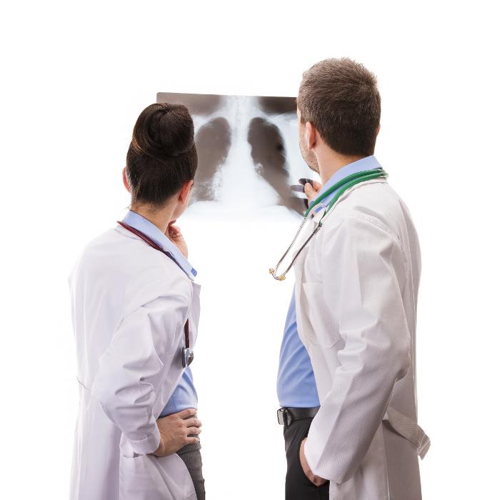 dentist looking at x-rays | general dentist sunnyvale ca