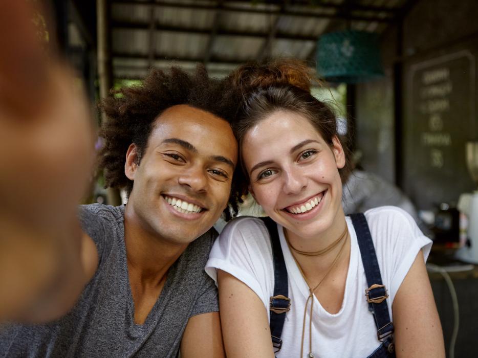 young couple smiling | veneers sunnyvale