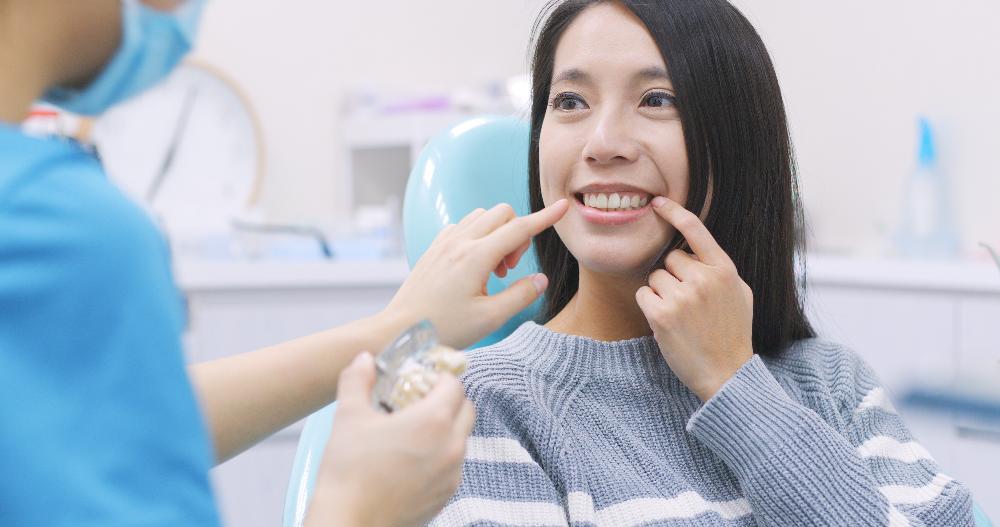 young woman sitting in dental exam chair | sunnyvale family dentist