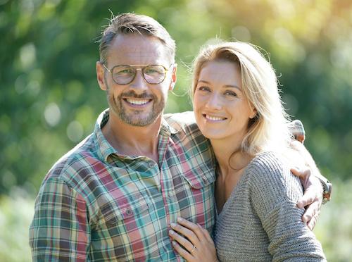middle-aged couple hugging | cosmetic dentistry sunnyvale ca