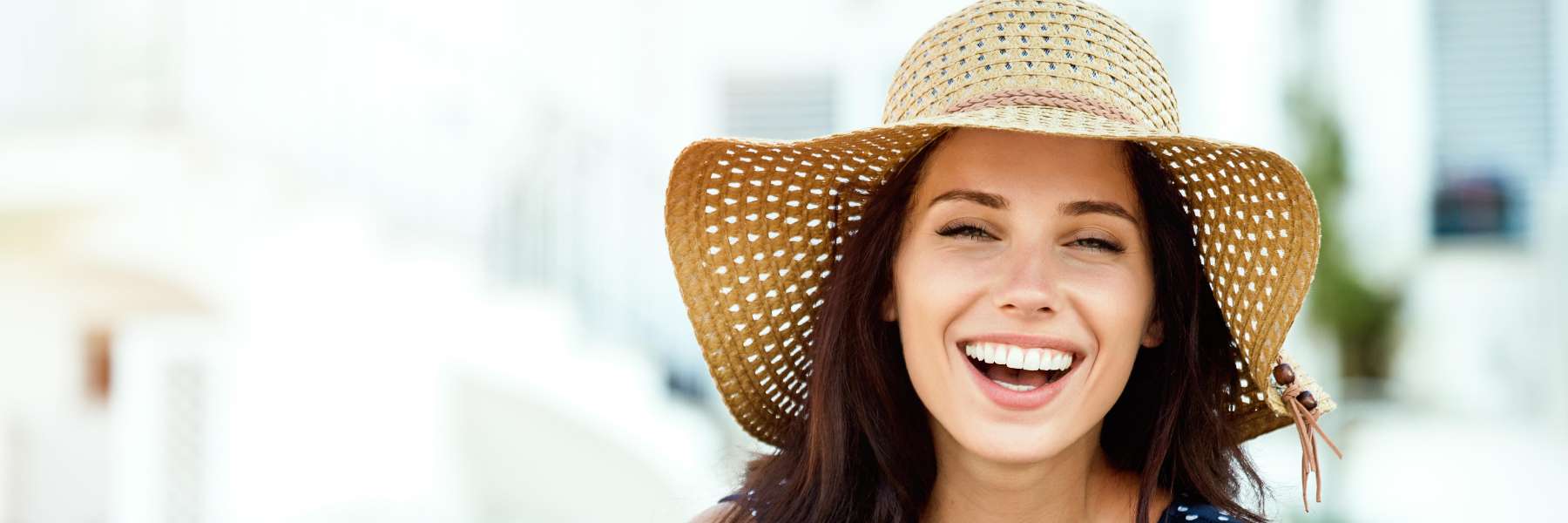 woman in hat smiling | dentist sunnyvale ca