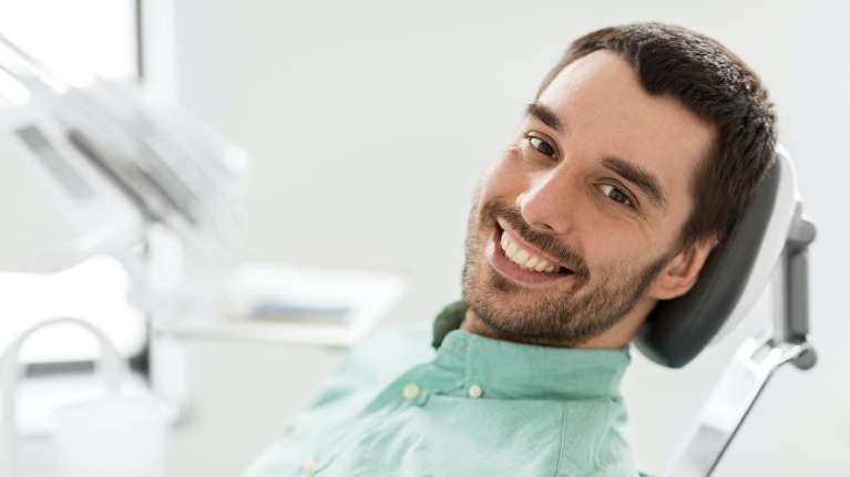 man laying in dentist exam chair | dentist sunnyvale ca