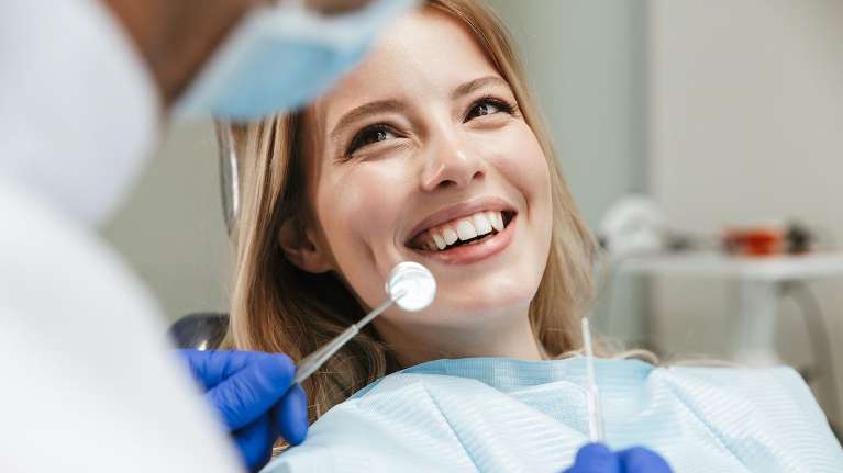 patient receiving dental exam | sunnyvale ca dentist