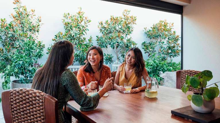 group of friends sitting | dentist sunnyvale ca
