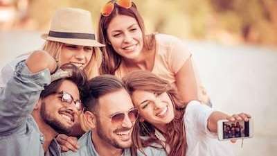 group of adults taking selfie | cosmetic dentistry sunnyvale ca
