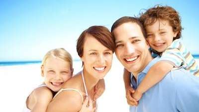 family of four on beach | dentist sunnyvale ca