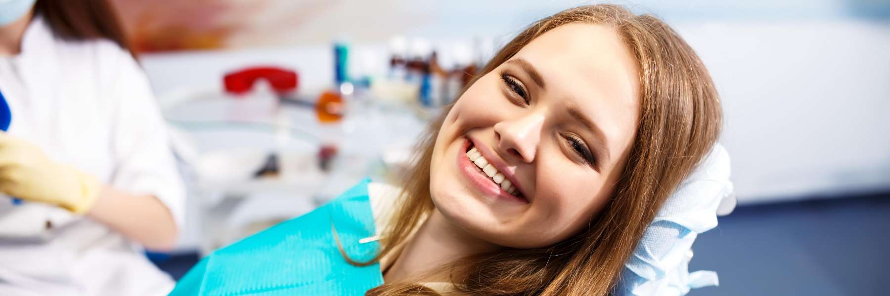 woman sitting in chair smiling | sunnyvale ca dentist