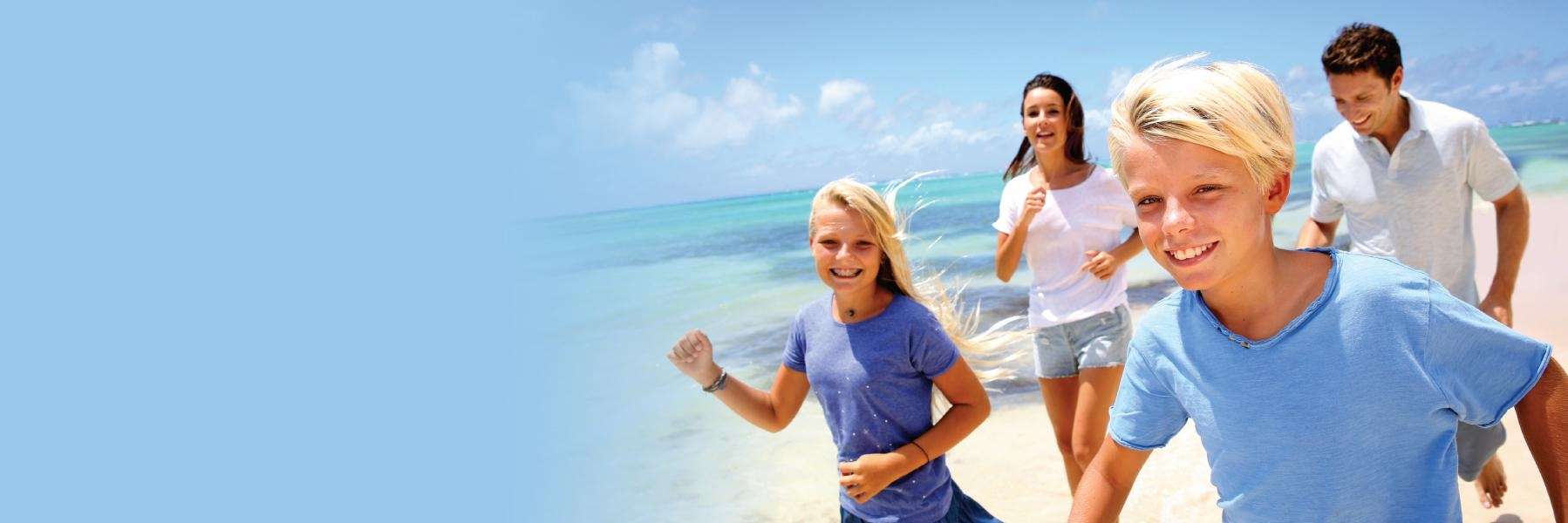 family of four on beach | general dentistry sunnyvale ca