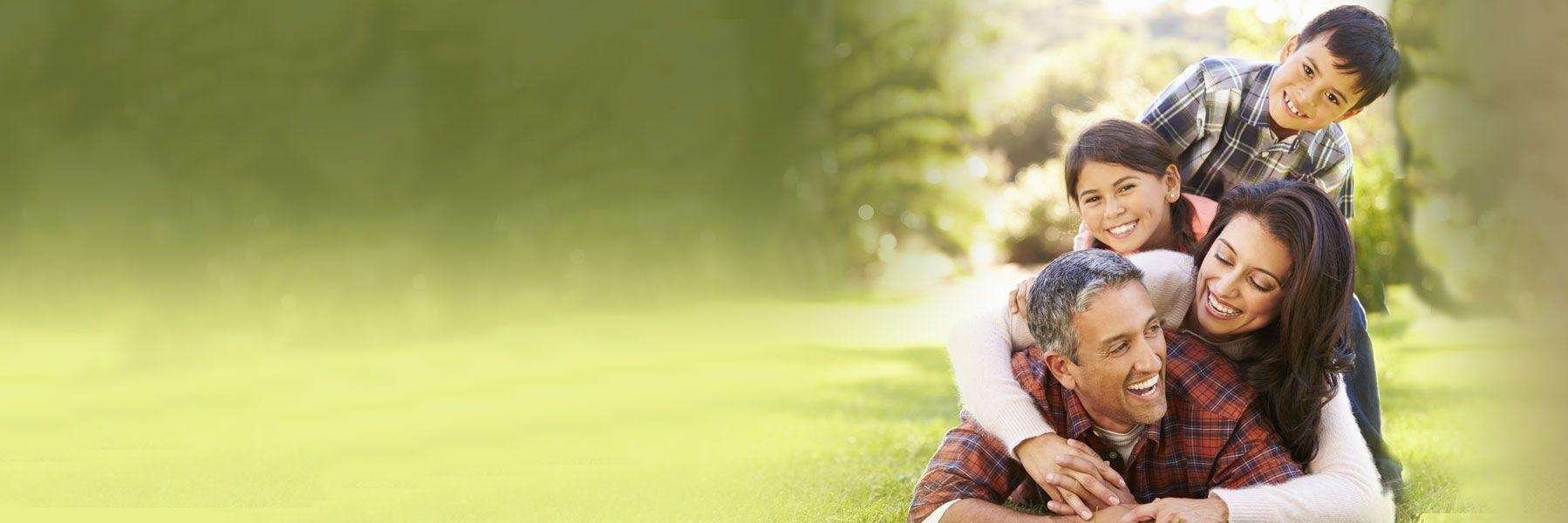 family hugging outside | dentist sunnyvale ca