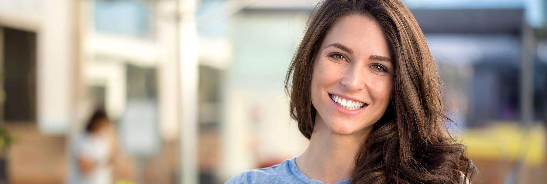 woman with brown hair smiling | cosmetic dentist sunnyvale ca
