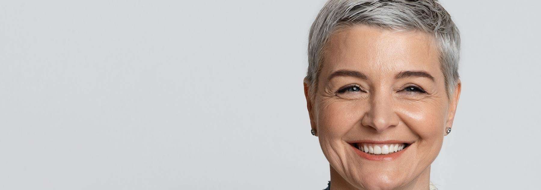 woman with short hair smiling | dental implants sunnyvale ca
