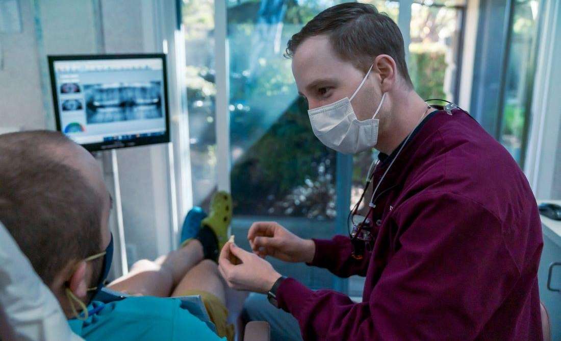 dr neri working with a patient | dental office sunnyvale ca