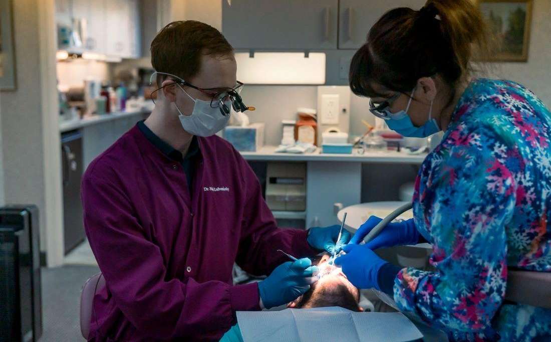dr neri and assistant working | sunnyvale ca cosmetic dentist